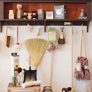 Shelf with brooms dishbrushes and marius fabre