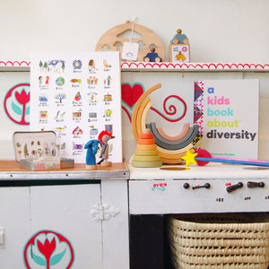 Kid Kitchen with wooden toys and books 