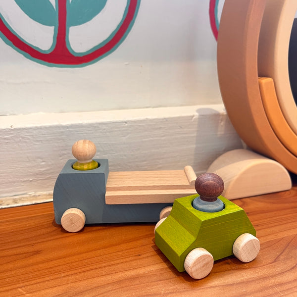 Grey Tow Truck with Green Car