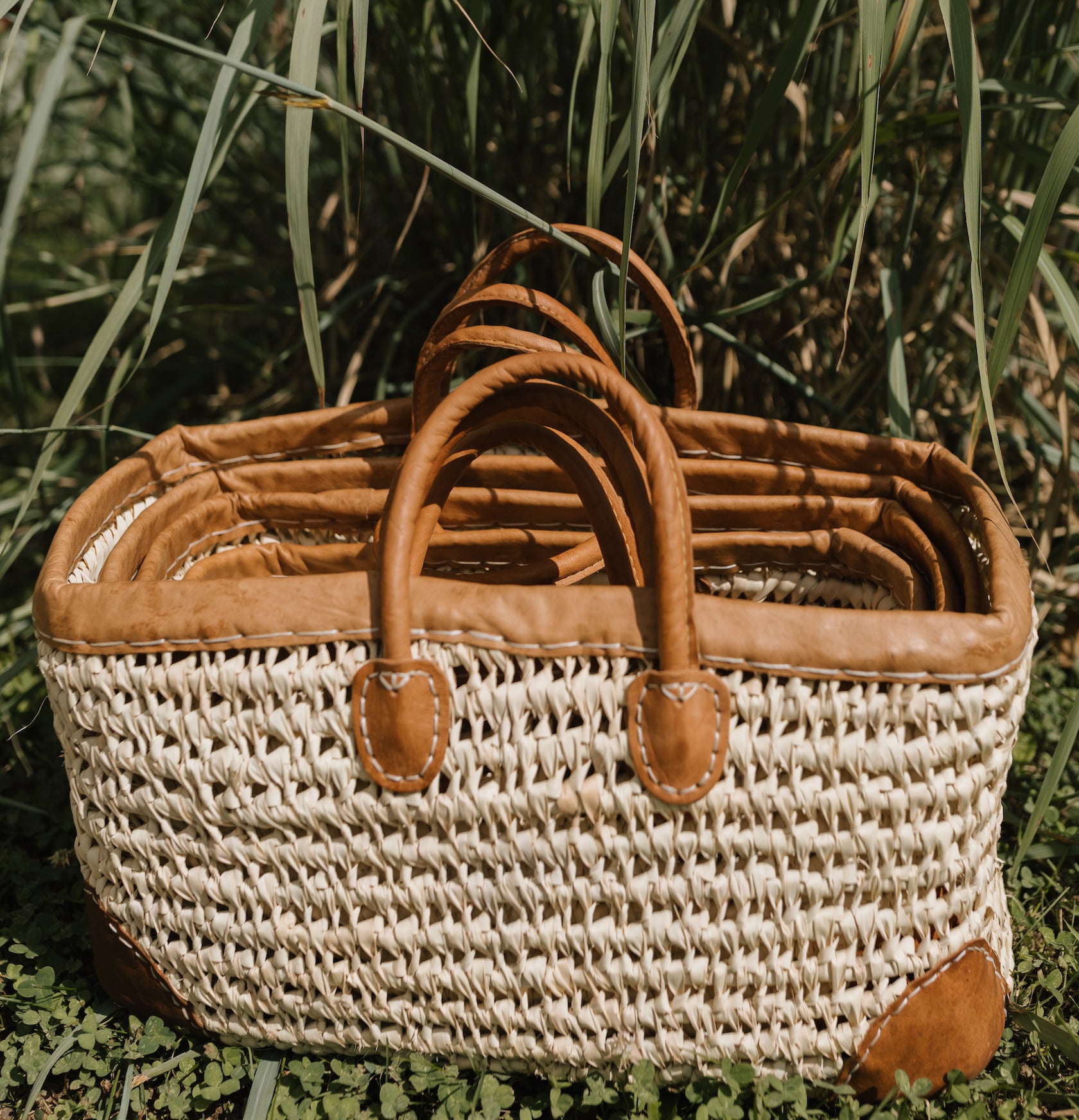 Open Weave Basket with Leather Straps and Leather Corners